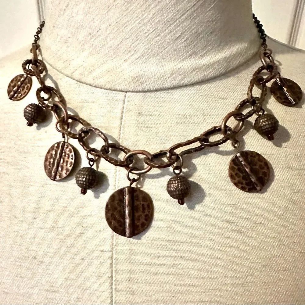 Copper tone charm necklace